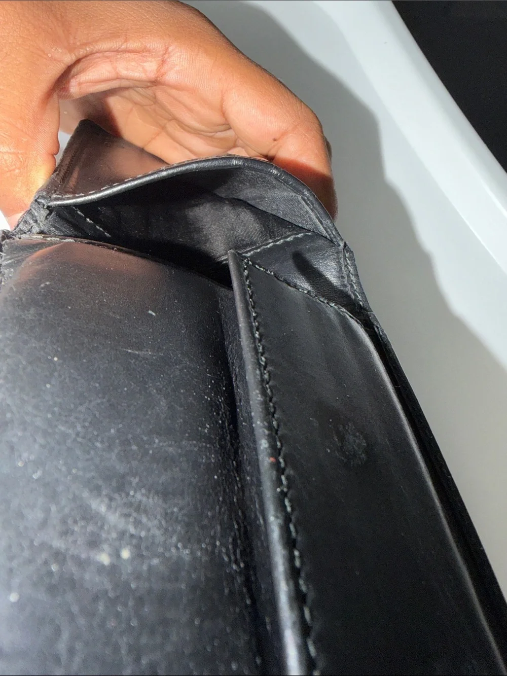 Gucci Black Embossed Interlocking G Leather Bi-Fold Wallet